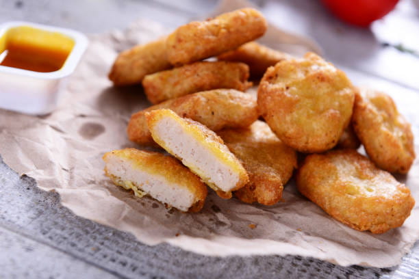 خرید ناگت مرغ فله ای و قیمت فروش استثنایی